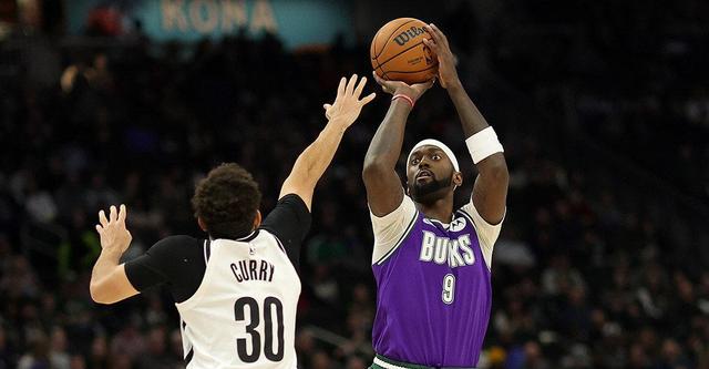 爱游戏登录入口-魔术客场逆转篮网，终结对手连胜